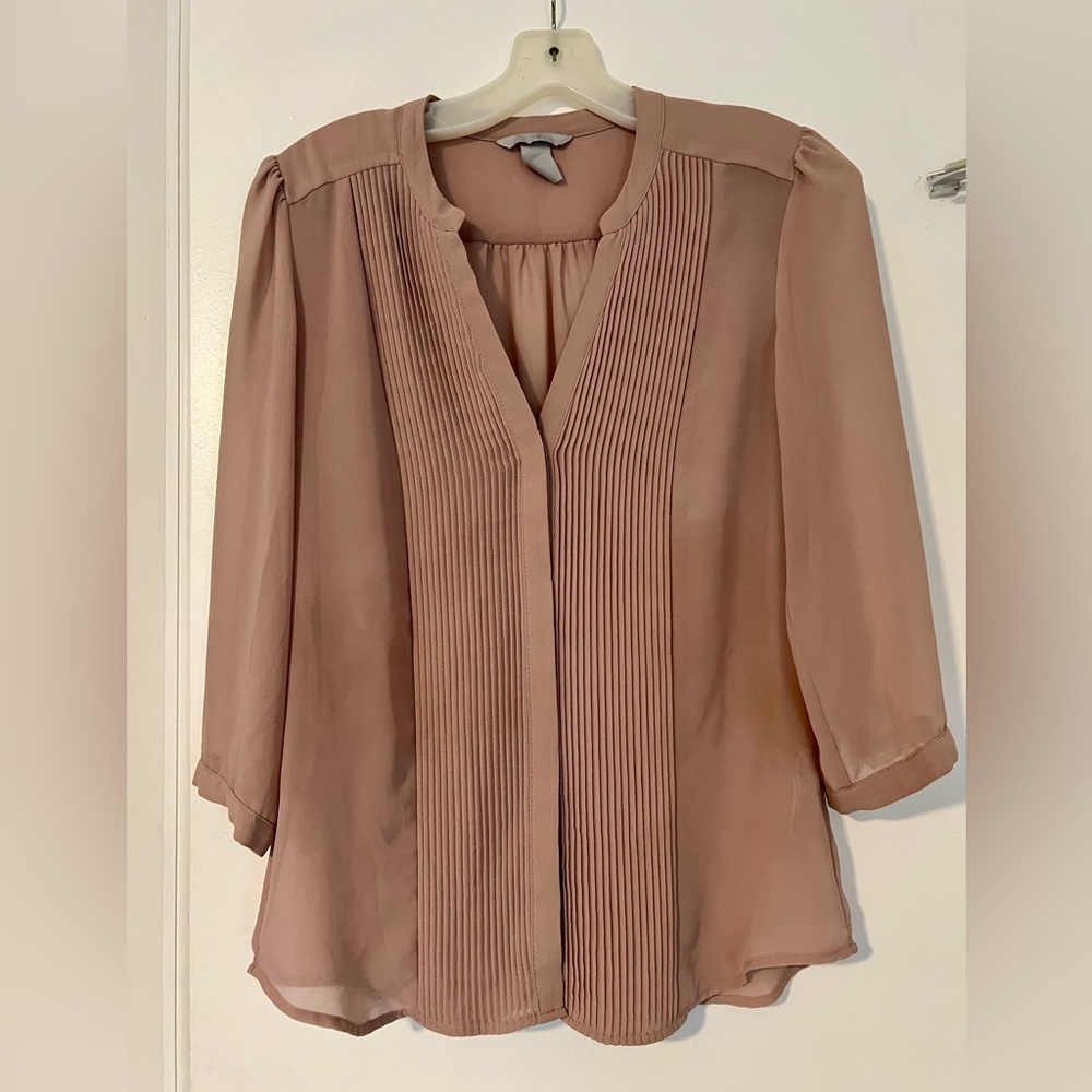 Tan with a rosey color to it, size M, bottom down dressy top